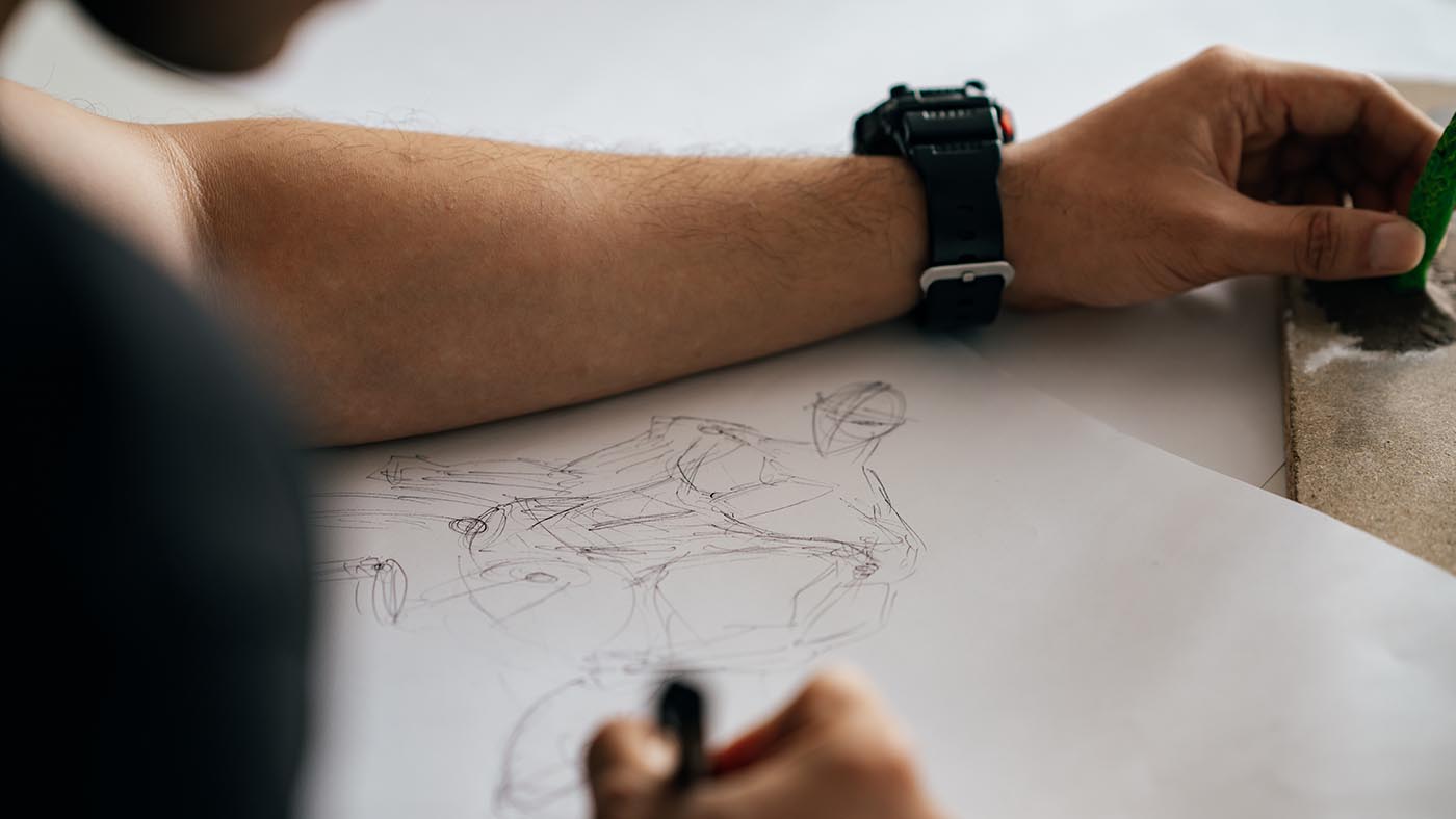 sae-games-art-animation-course-enquire-now A close-up of a student drawing game art.